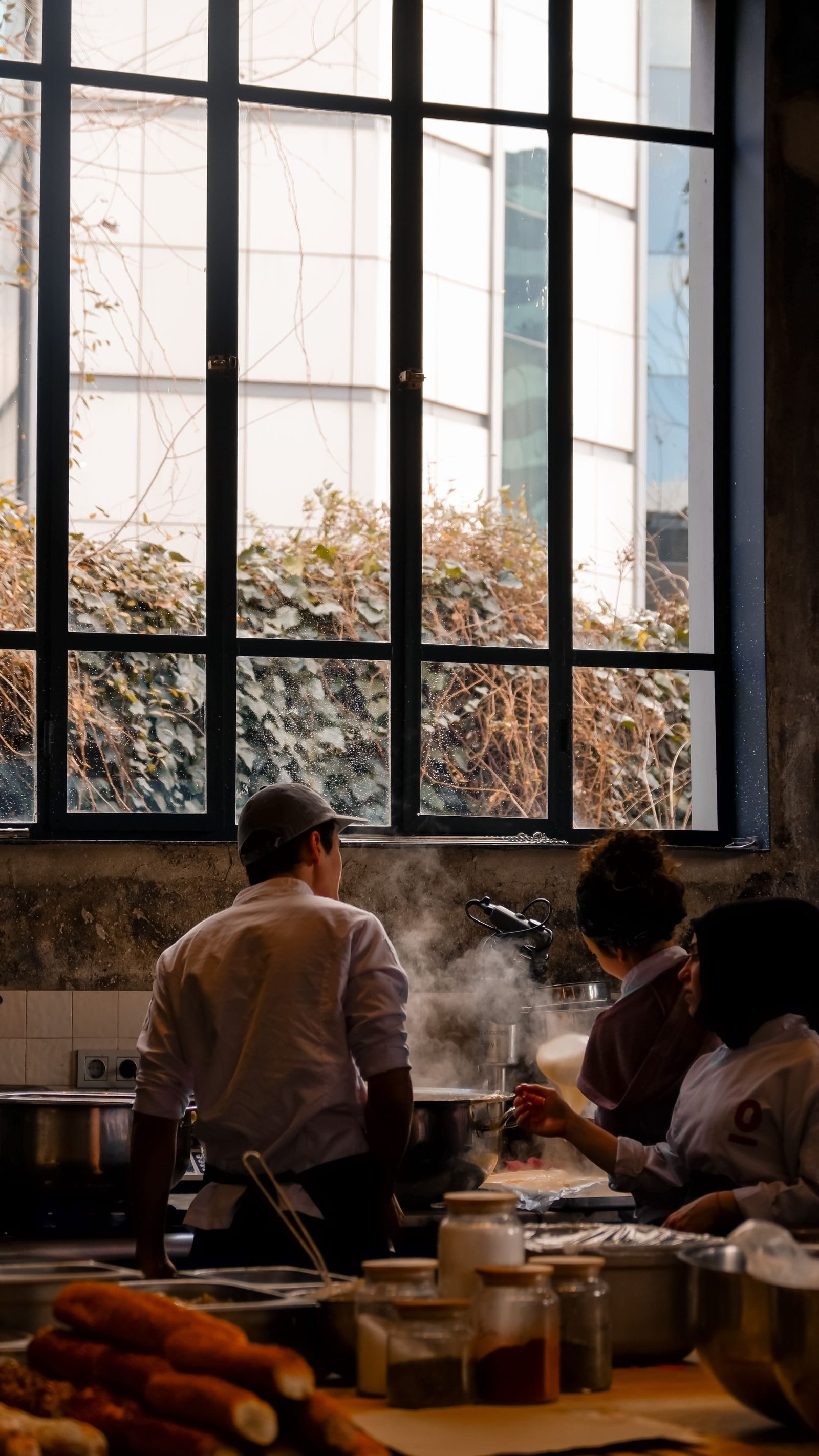 Professional kitchen team working together during service